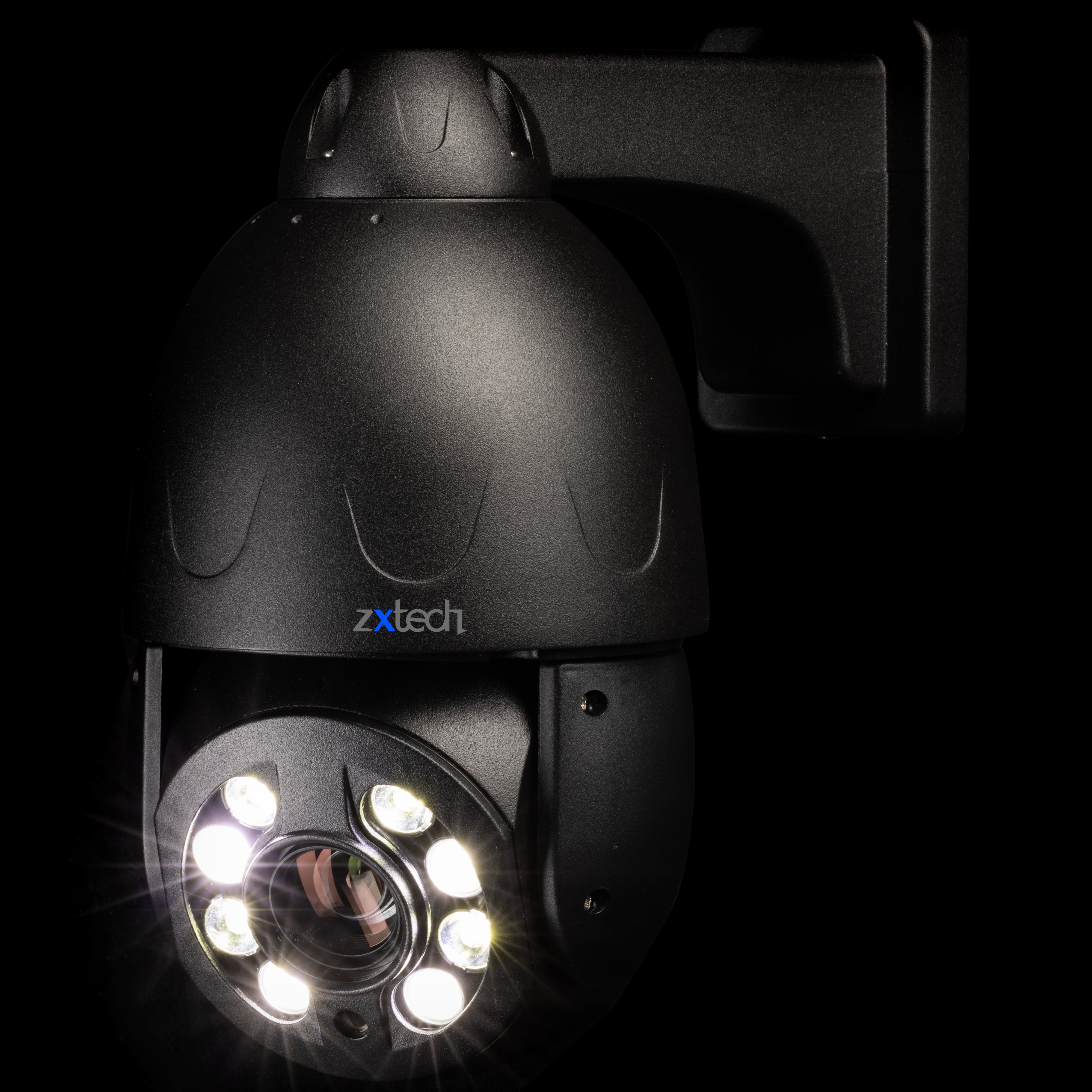 Outdoor Zxtech PoE PTZ camera mounted on a wall, auto-tracking movement with its 20X zoom lens and smart motion detection